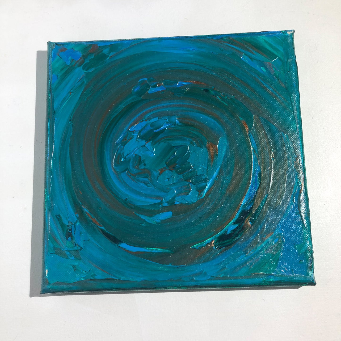 Blue, Bronze, and Green Sirl Painting
